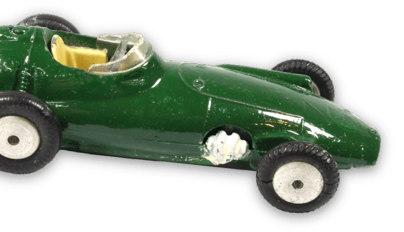 green toy car with damage